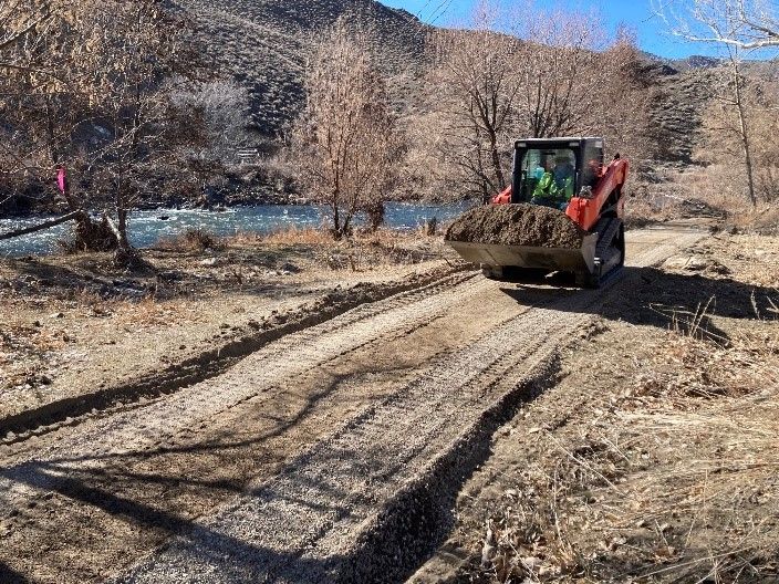construction equipment building trail along Truckee River